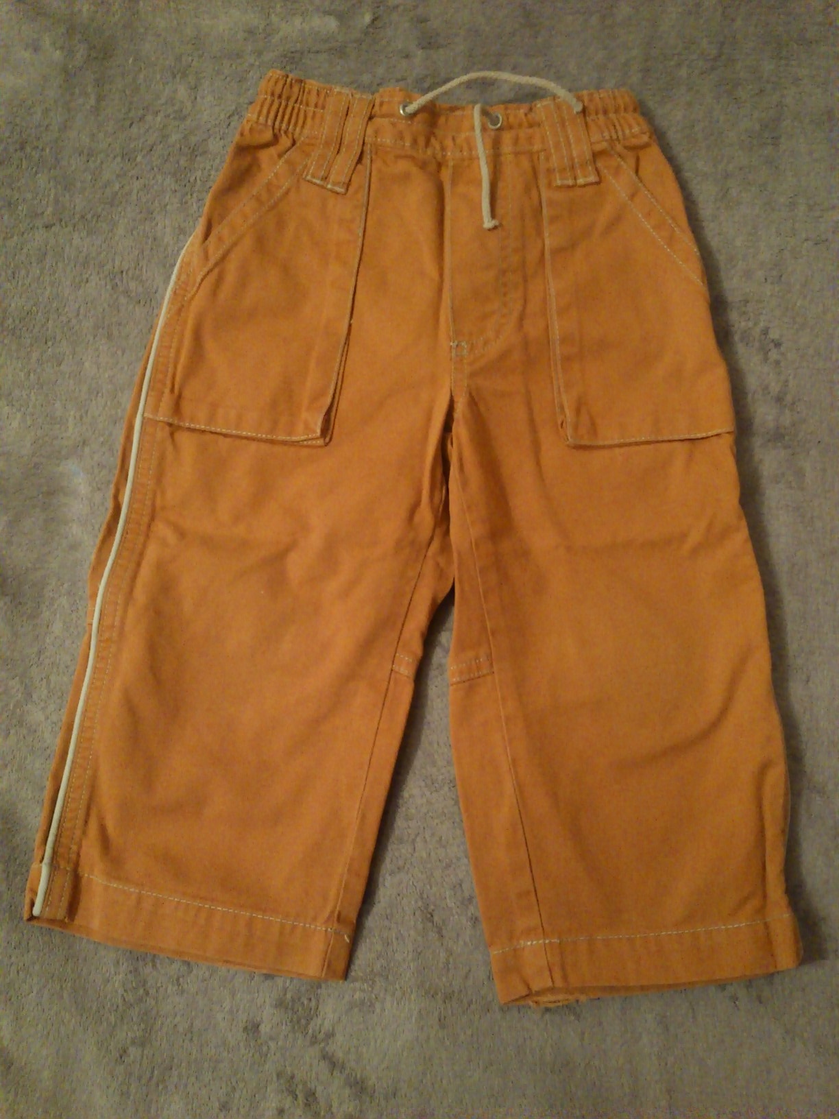 Продам: Оранжевые джинсы, р-р 86 - 92