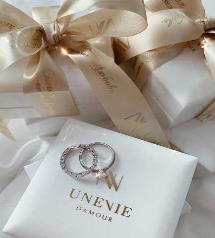 Продам: Обручальные и помолвочные кольца "UNEVIE