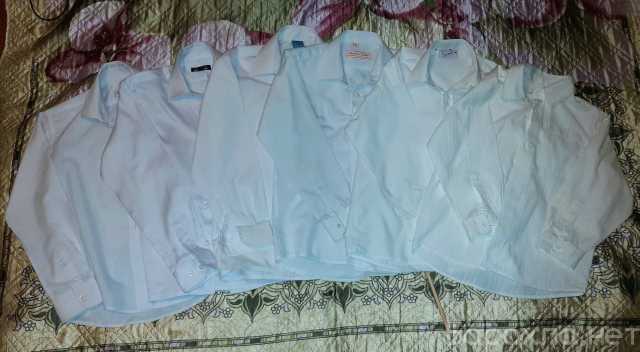 Продам: Белые рубашки на школьника 128см,134-140