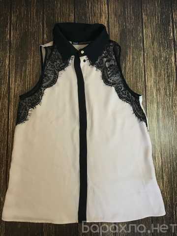 Продам: Женскую блузку