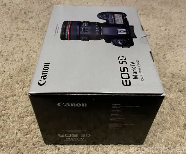 Продам: Canon EOS 5D Mark D SLR Camera w / Lens