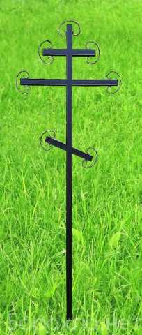 Предложение: Металлический крест на кладбище